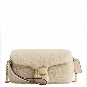 Coach Beige Shearling Clutch with Gold Accents